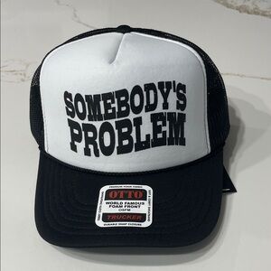 SOMEBODY’S PROBLEM Black and White Trucker Hat